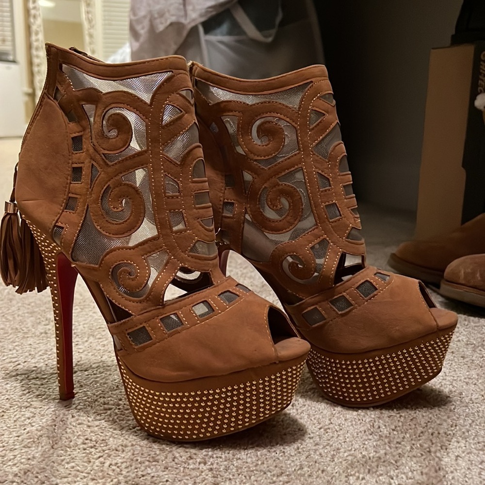 High heels, light brown/tan. Liliana. Soles red because I painted them.
